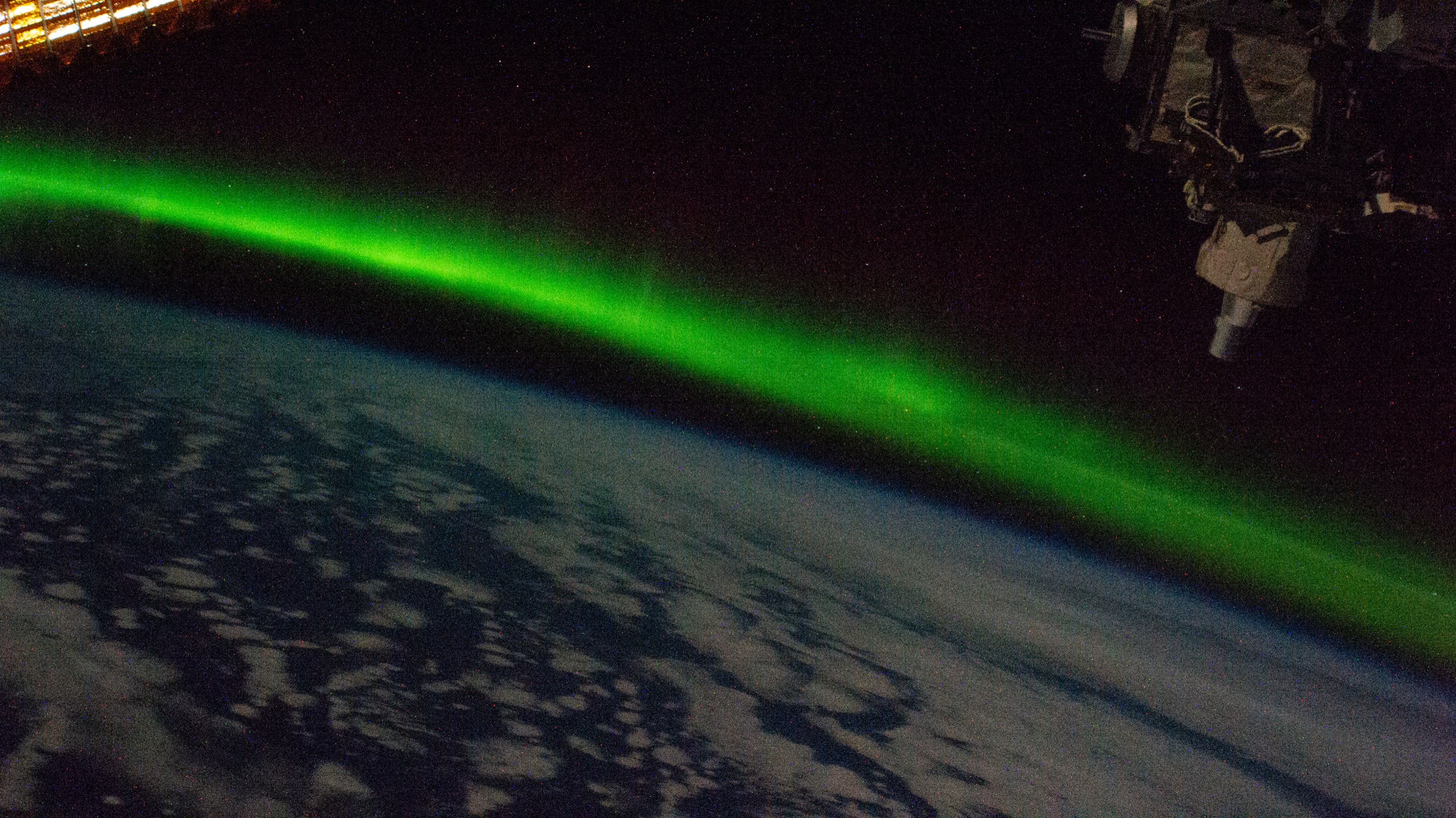 An aurora over Earth, photographed from the International Space Station
